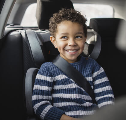 Child buckled in car seat